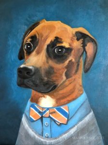 Pet portrait of foxhound dog wearing sweater and bow tie