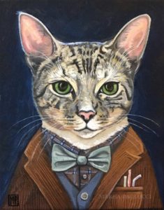 Cat wearing corduroy jacket and bow tie