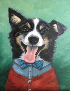 Dog wearing red cardigan sweater and bow tie